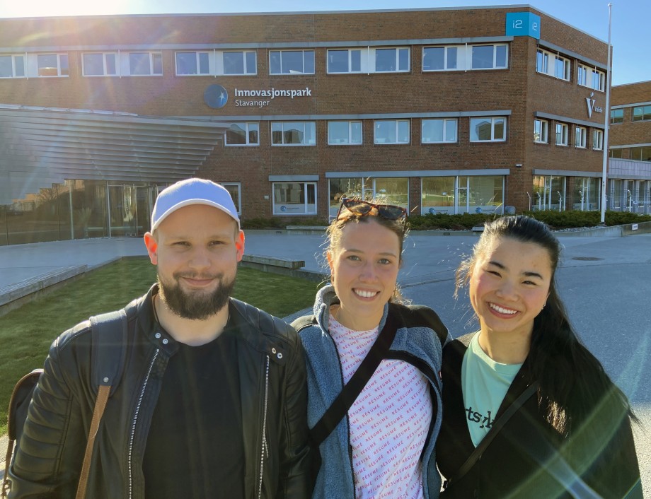 Three smiling nurse students.